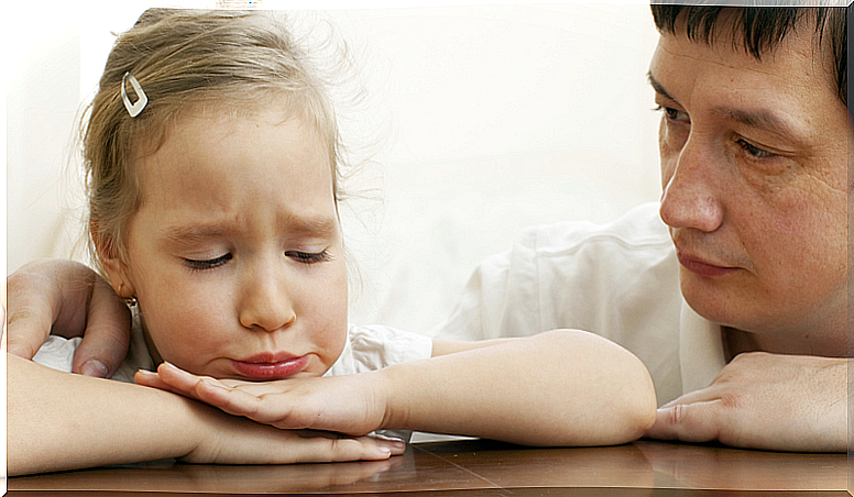 Little girl crying over her parents' divorce