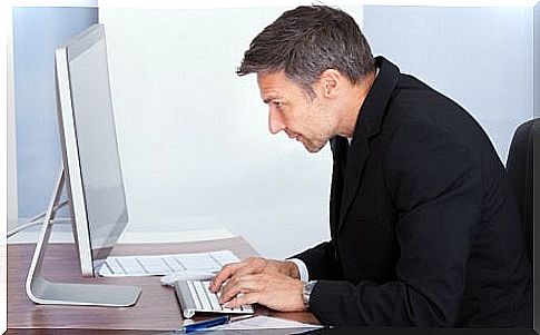 Man sitting with bad posture